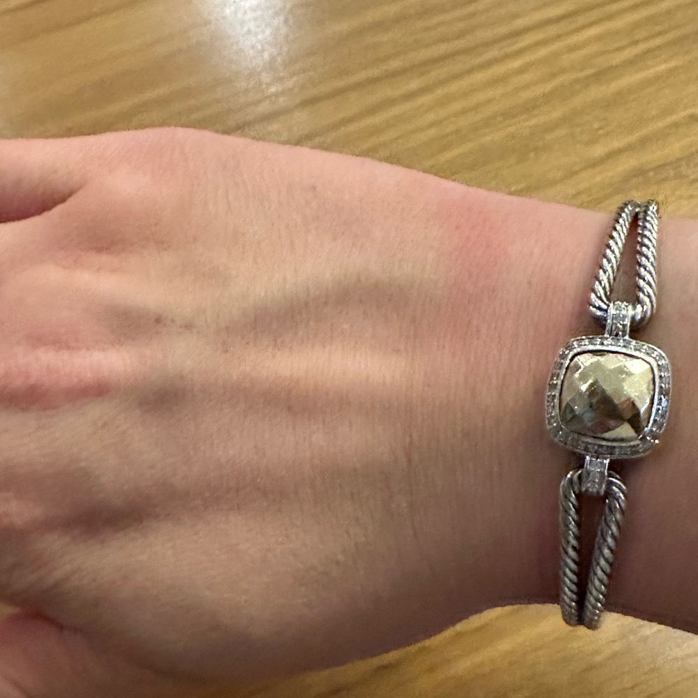 David Yurman bracelet for sale! Great condition, yellow stone in middle